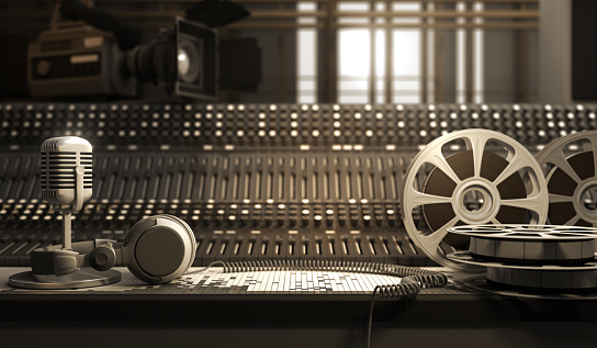 Reel with tape and studio equipment