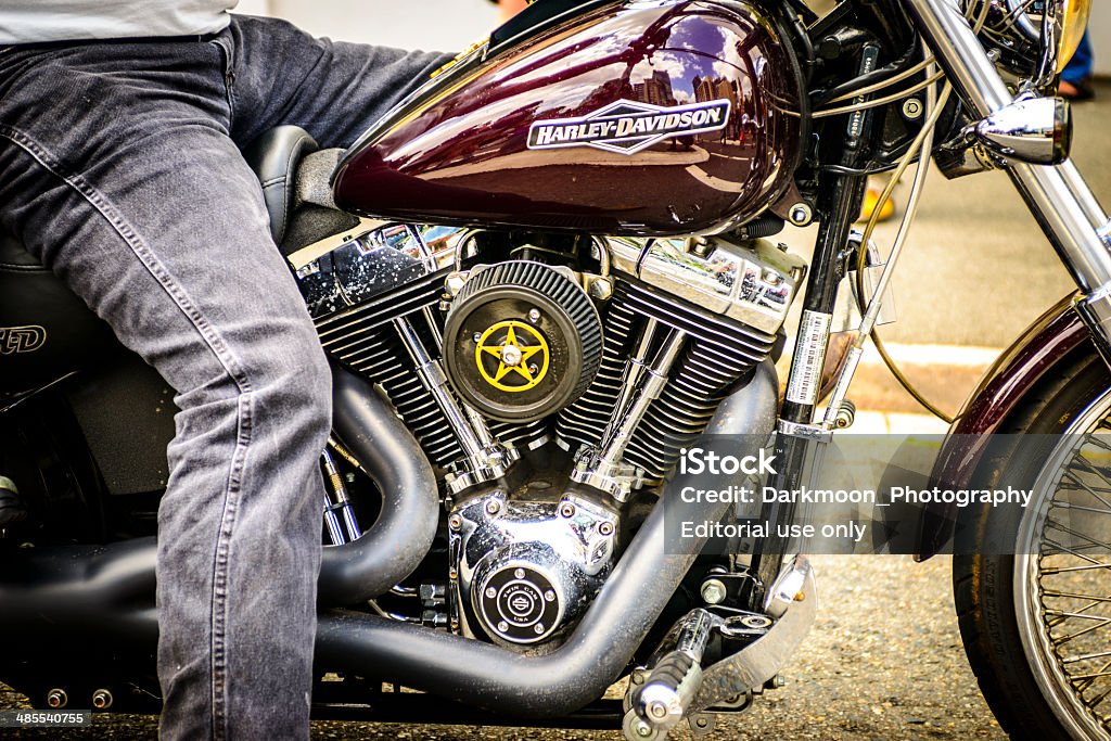 Harley Davidson at bikie rally Brisbane, Australia – January 26, 2014: A protester on a Harley Davidson motorcycle idles at the lights following the Freedom Day Rally against the Campbell Newman governments anti-bikie laws. Harley-Davidson Stock Photo