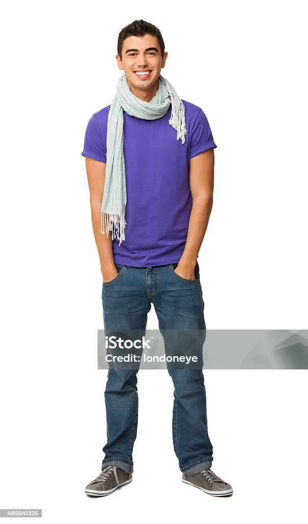 Trendy Young Man Standing With Hands In Pockets - Isolated Full length portrait of young man in trendy casual wear standing with hands in pockets. Vertical shot. Isolated on white. 16-17 Years Stock Photo