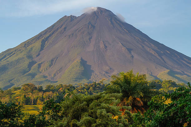 Volcan arenal by sunrise stock photo