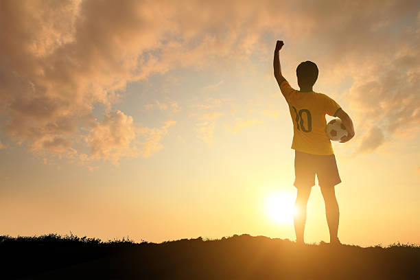 Man and soccer silhouette