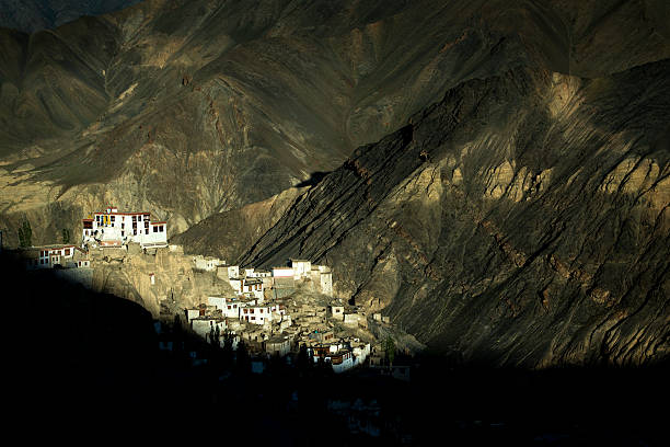 Last sunlight at the Tibetan Buddhist monastery of Lamayuru in Ladakh, Northern India. The monatery is belonging to the Drikung Kagyu school of Tibetan Buddhism and is situated on the Srinagar - Leh highway in an altitude of 3.510 m (11.520 ft).