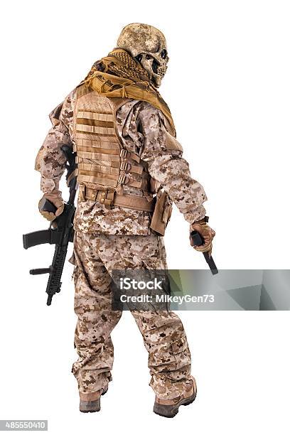 Unrecognizable Criminal With Handgun And Rifle Stock Photo - Download Image Now - Mask - Disguise, Military, Armed Forces