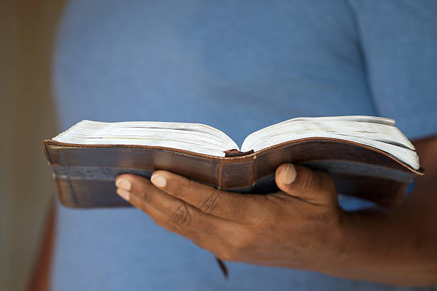 istock Man holding a Bible 485550750