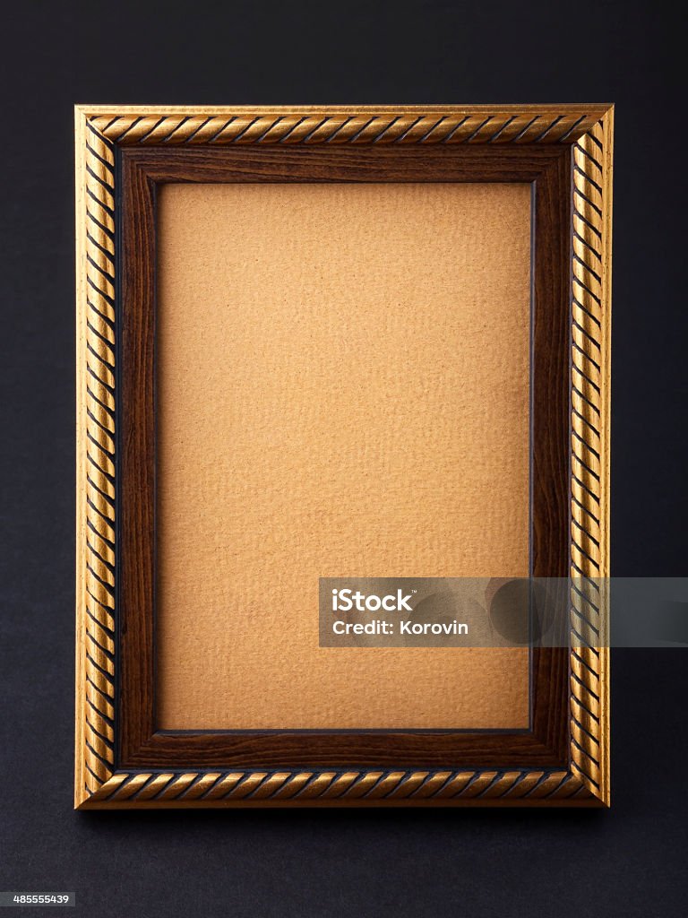 Gold frame over black background Antique Stock Photo