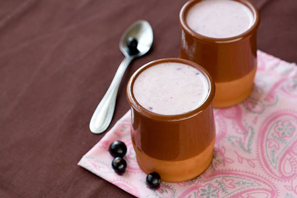 istock Homemade yogurt with berries in a ceramic bowl 485560222