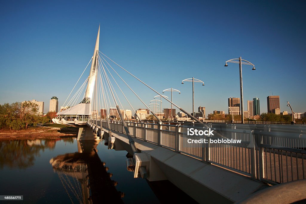 Unique walkway bridge over the Red River in Winnipeg Winnipeg Stock Photo