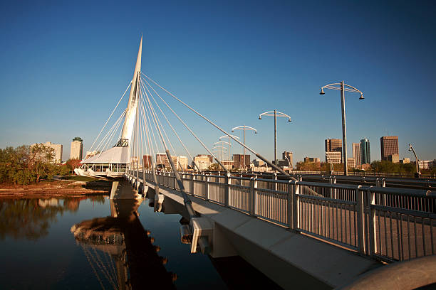 Unique walkway bridge over the Red River in Winnipeg stock photo