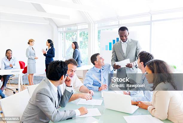 Group Of Multi Ethnic Corporate People Having A Business Meeting Stock Photo - Download Image Now