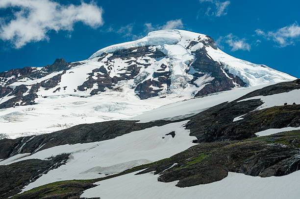 Mt. Baker, Washington. The snow fields surrounding Mt. Baker and the Coleman glacier make for a beautiful and dramatic landscape in the North Cascade Mountain range of Washington State. north cascades national park cascade range waterfall snowcapped stock pictures, royalty-free photos & images