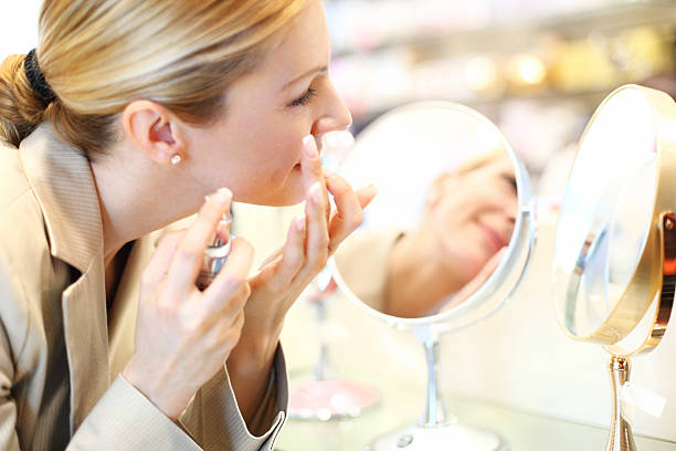 Woman buying cosmetics.