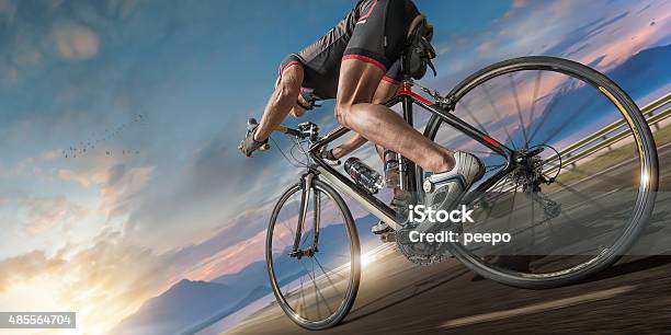 Cyclist Moving Fast On Coastal Path Stock Photo - Download Image Now - Cycling, Bicycle, Sports Race