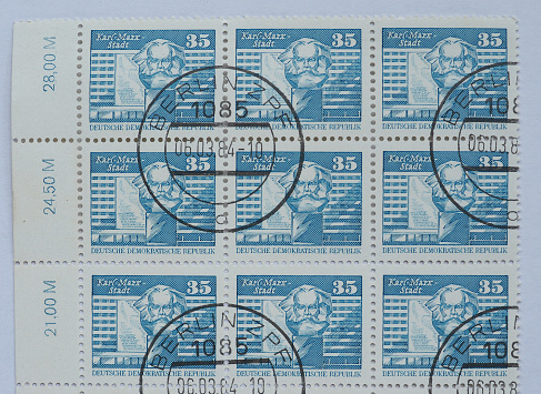 CHEMNITZ, GERMANY - CIRCA 2015: A stamp printed by East Germany shows the Karl Marx monument in Karl Marx Stadt, now known as Chemnitz