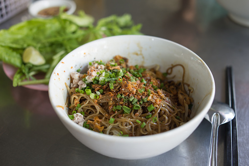 Normally, Hu Tieu Nam Vang is served with shrimp, meat, pork bones, etc. However, this picture is a bowl of HU TIEU NAM VANG but it's a dry version. So people often eat them with a bowl of soup and Nuoc Cham.