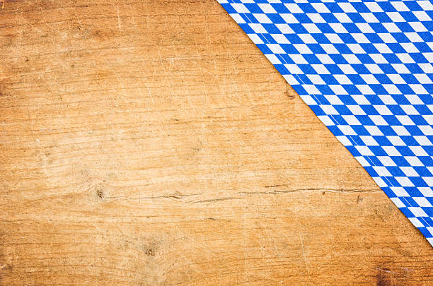 istock Wooden background with a bavarian table cloth 485573466