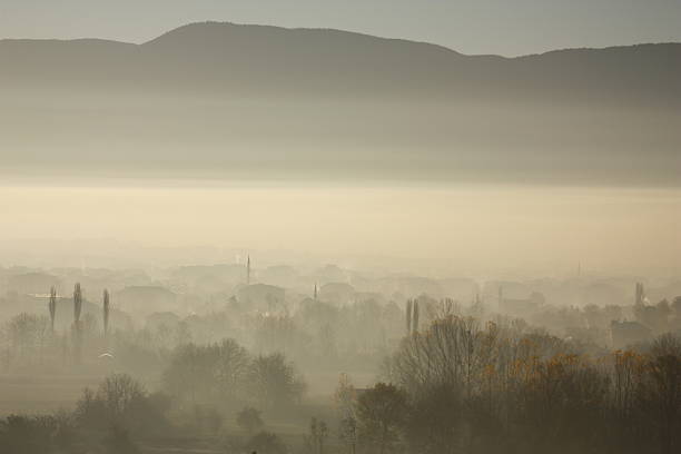 istock city in the fog 485573810