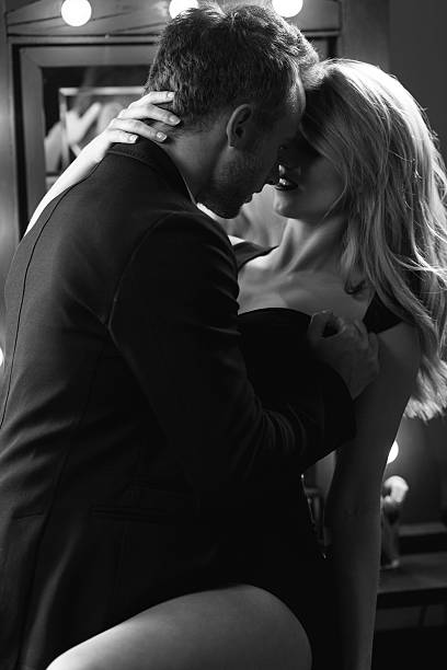 istock Couple embracing and kissing 485574760