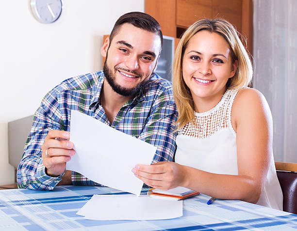 istock Couple filling forms for bank 485579408