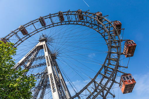 Vienna, Austria - April 25, 2015: view of the Wiener Riesenrad in Prater from outside the park. The big wheel was constructed in 1897 by the English engineer  Walter Bassett
