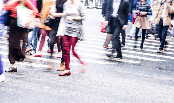 istock People walking on big city street 485582497