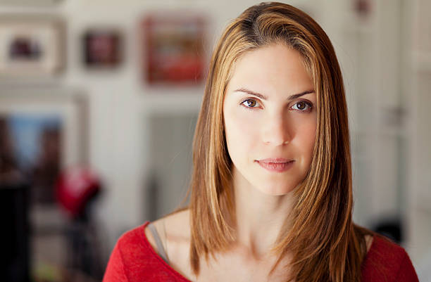 Portrait Of A Serious Woman looking at the camera stock photo