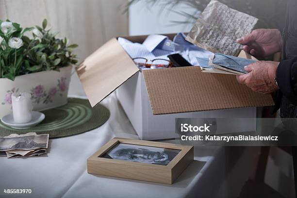Packing Remembrances After Dead Husband Stock Photo - Download Image Now - Box - Container, Senior Adult, Souvenir