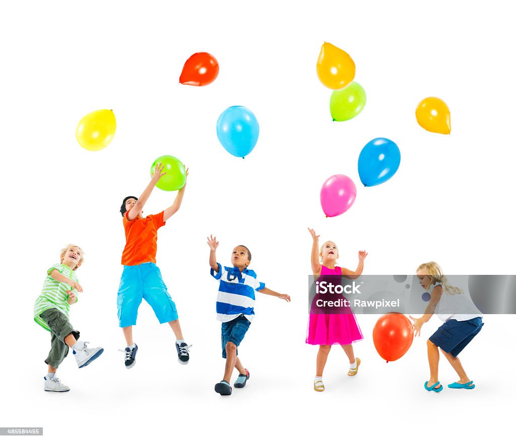 Happy Multi-Ethnic Children Playing Balloons Together Child Stock Photo