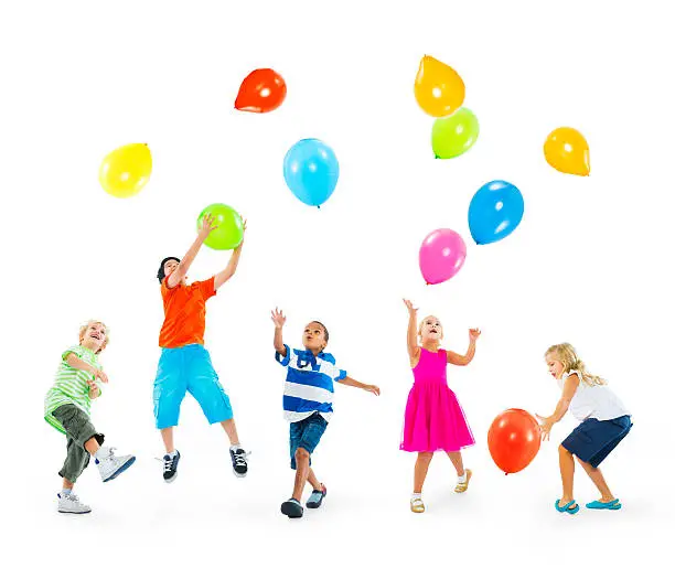 Photo of Happy Multi-Ethnic Children Playing Balloons Together