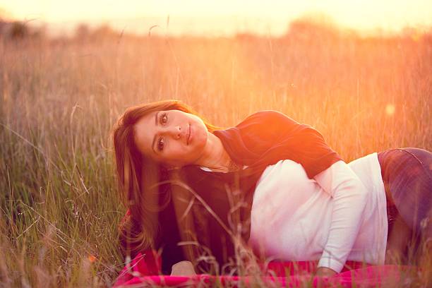 istock Young happy woman enjoying sunlight 485587175