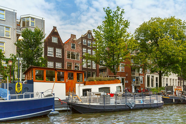 istock Amsterdam canal and typical house, Holland 485587278