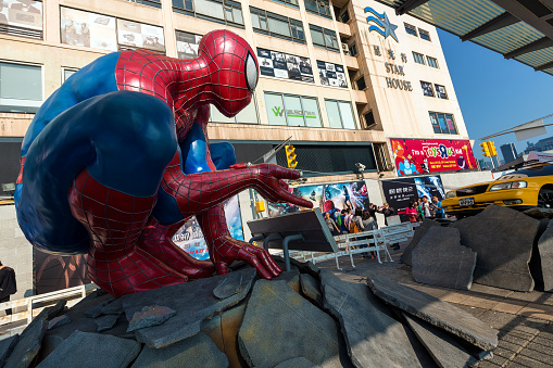 Tsim Sha Tsui, Hong Kong, China - April 9, 2014:The Spider-Man statue to promote the upcoming movie “The Amazing Spider-Man 2″ outside a Harbour City shopping mall in Hong Kong.