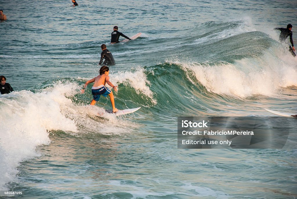 Surfer Boy Rio de Janeiro, RJ, Brazil - April 09, 2014: Beach Stock Photo