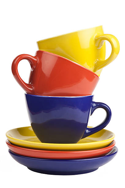 istock Colorful tea cups and saucers, isolated on white 485589355