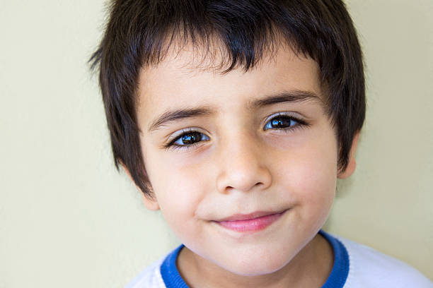 istock Portrait of a smiling child against colored background 485591726