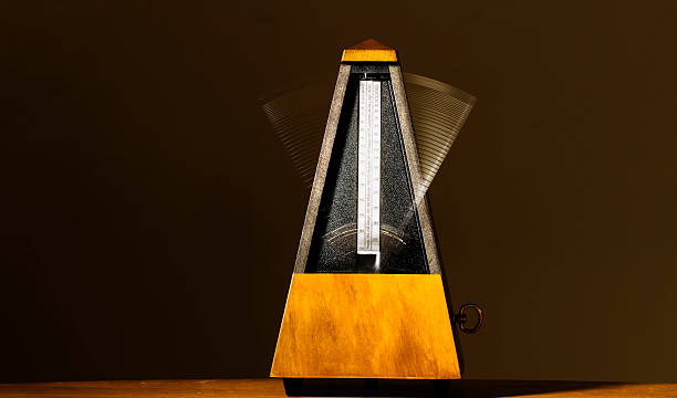 istock Wooden Mechanical Metronome With Motion Blur Arm 485592354