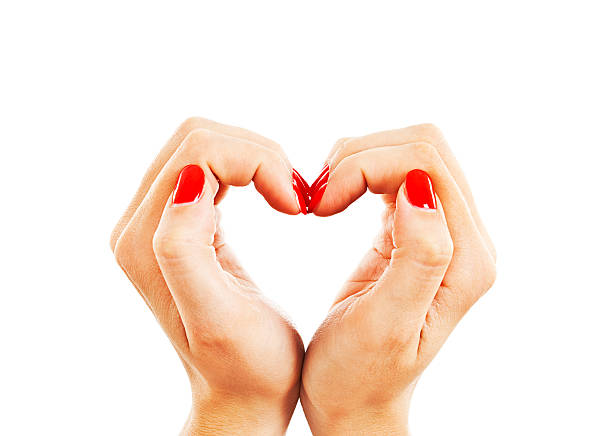 istock Hands with woman's professional red nails manicure 485592860