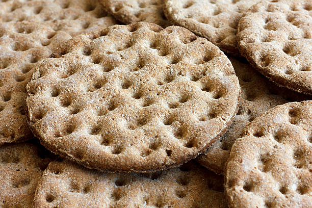 istock Heap of round rye crispbreads as a background. 485593678