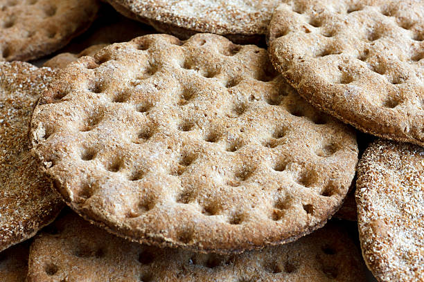 istock Heap of round rye crispbreads as a background. 485593686