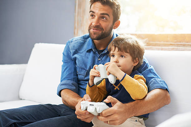 istock Guys and their games 485608140