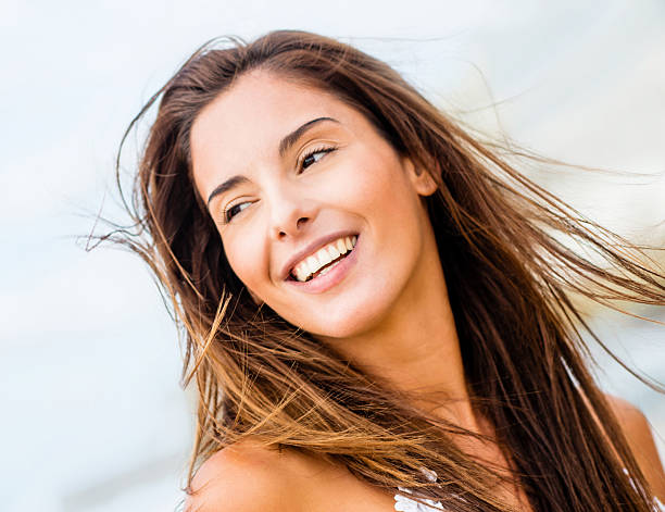 istock Beautiful woman at the beach 485608727
