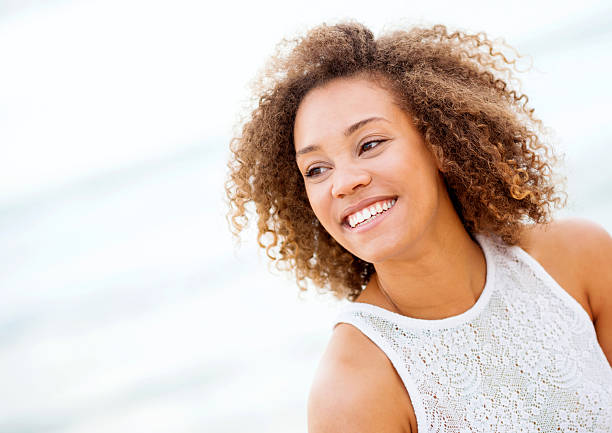 istock Beautiful woman at the beach 485608739