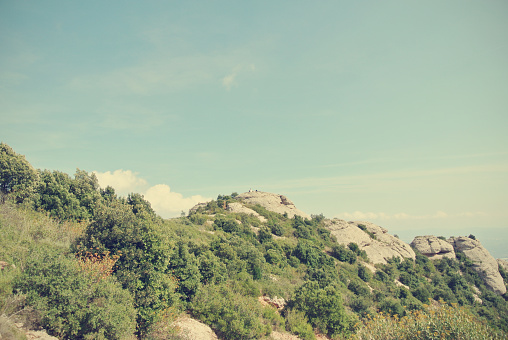 Montserrat mountain, Catalonia, on a sunny afternoon; retro style