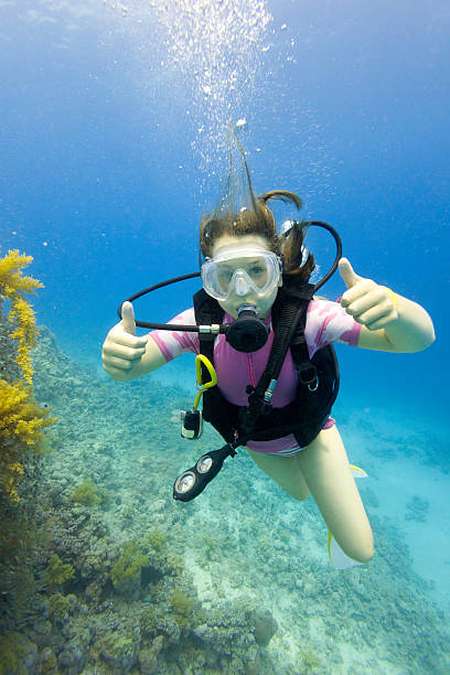 Young Girl Scuba Diving stock photo