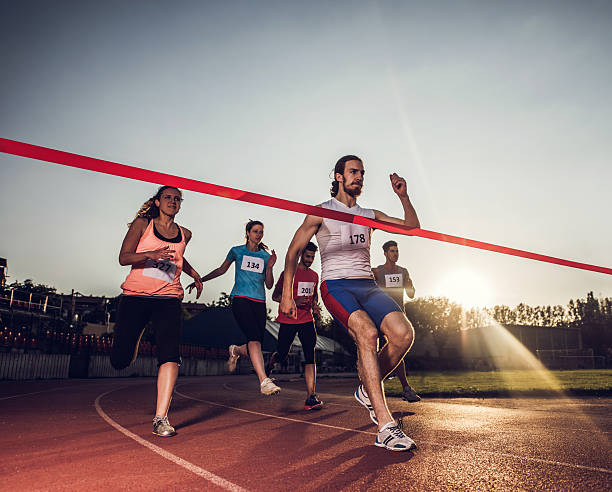 istock Young runners having a sports race on a stadium. 485614712