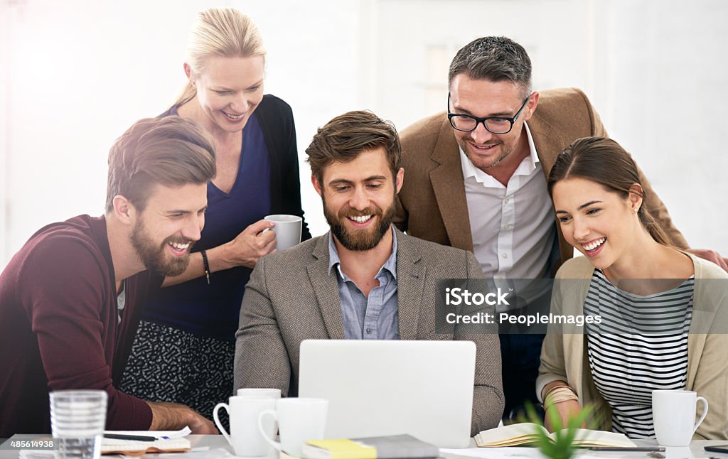 Combining their creative powers to deliver top-notch work Shot of businesspeople working together at a laptophttp://195.154.178.81/DATA/i_collage/pi/shoots/805456.jpg 2015 Stock Photo