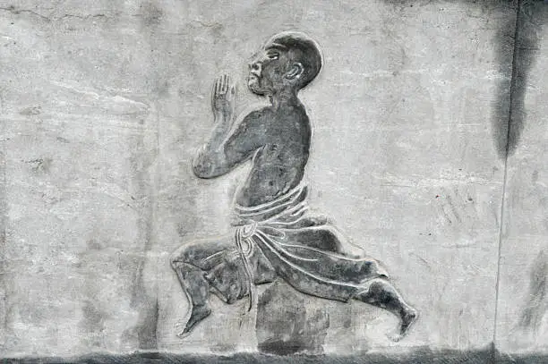 Stone illustration of health related Qigong from the Chan Buddhist Tradition at the Shaolin Temple, Henan Province, China.