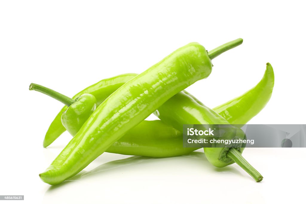 Green hot chili peppers green chili peppers isolated on white background.  Green Chili Pepper Stock Photo