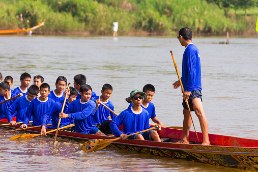 Nan, Thailand - October 13, 2013: Unidentified people rowing in boat race traditional events ,October 13, 2013 Nan, Thailand.