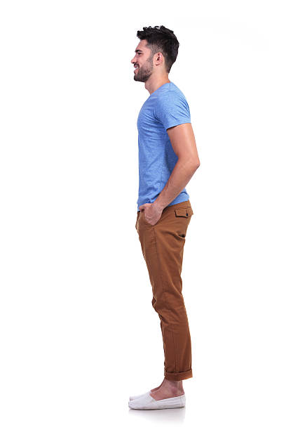 istock side view of a young casual man standing in line 485615857