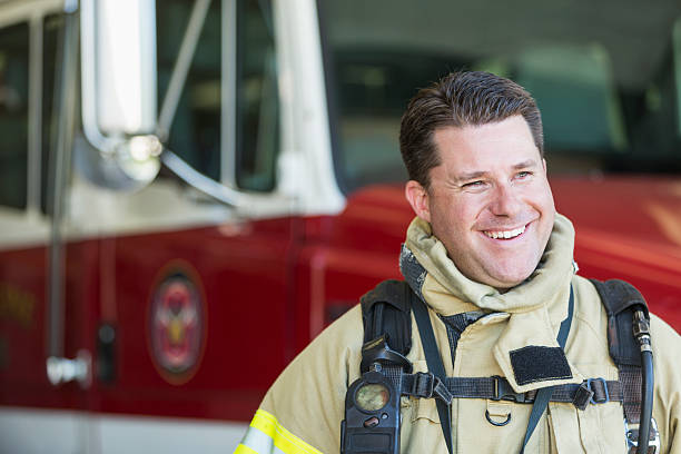istock Fireman in front of fire truck 485616530